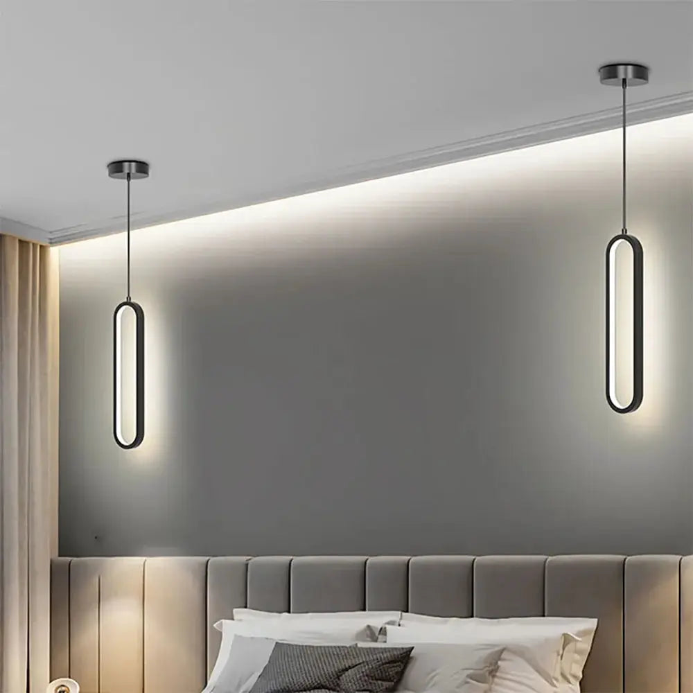 Modern minimalist LED pendant light chandelier with two black oval hanging lamps for the bedroom