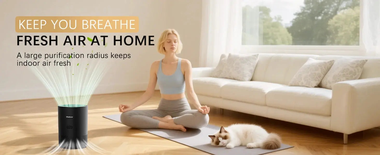 Chuboor air purifier in black cylinder for home use, shown with a person meditating on a yoga mat and a cat nearby.