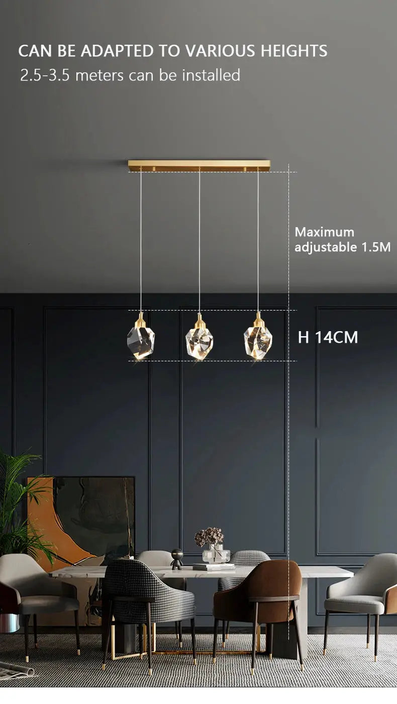 Ceiling pendant lamp by Simples Market with three crystal pendants on a gold bar