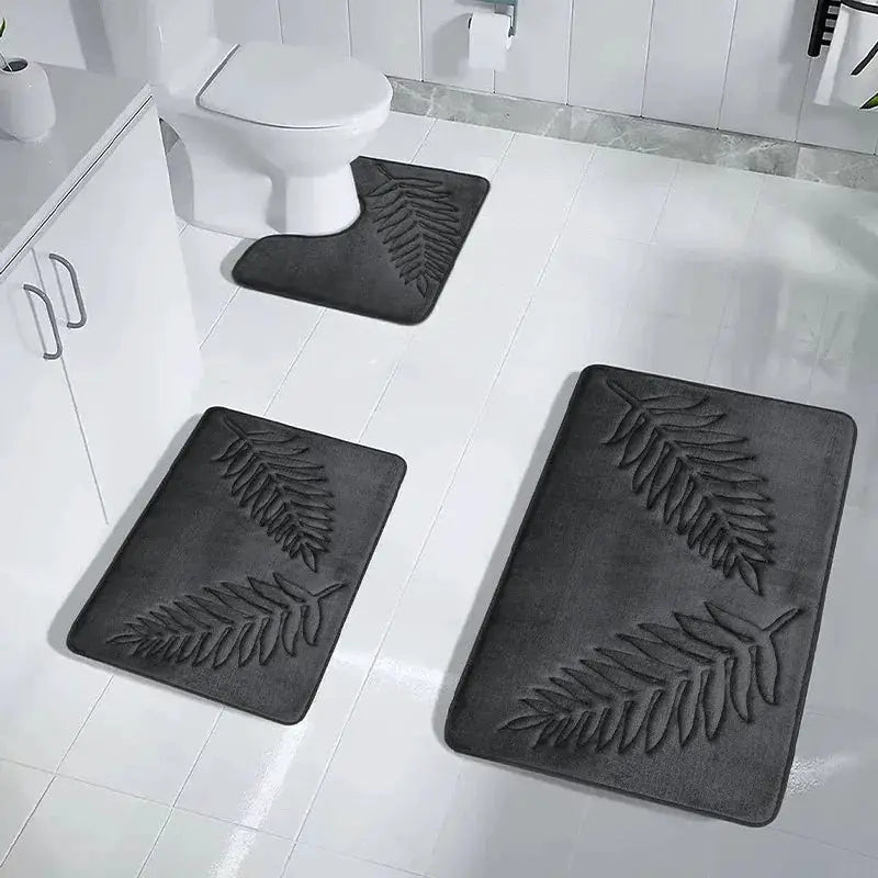 Simples Market 3-piece memory-foam bathroom mat set in charcoal with leaf embossing for toilet, tub, and floor
