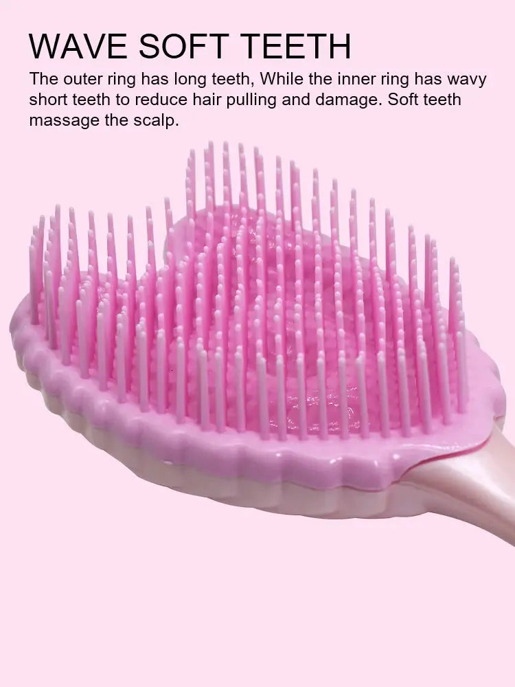 Pink mini paddle detangling hairbrush with soft flexible teeth, anti-static for salon use.