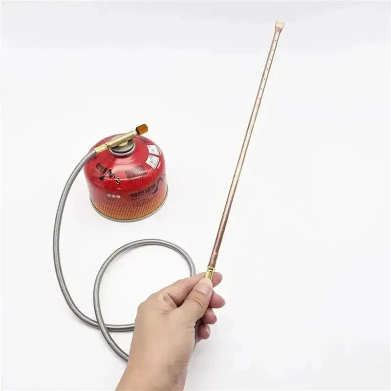 Simples Market Pandatour hand-held charcoal fire igniter spray gun with red canister, braided hose, and copper nozzle