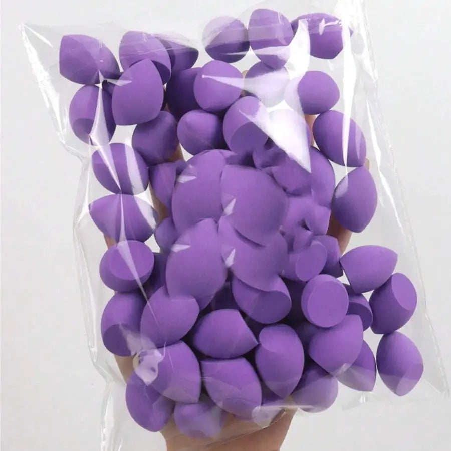 20PCS mini finger puff makeup sponges packaged in a clear bag, perfect for flawless makeup application.