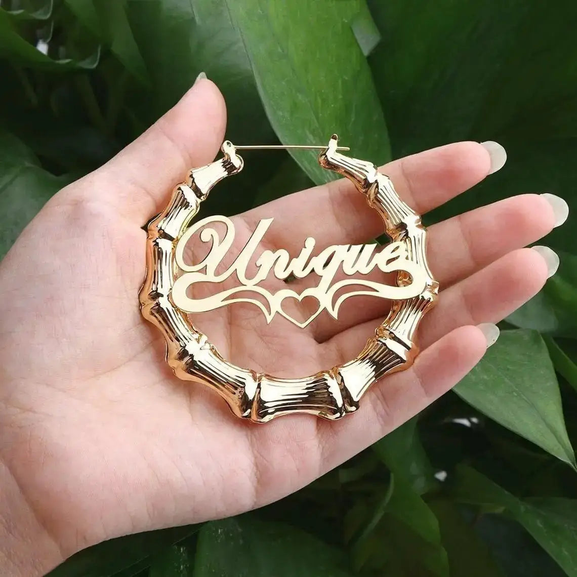 Gold bamboo hoop earring with a scripted Unique name pendant and heart motif; stainless steel, Simples Market