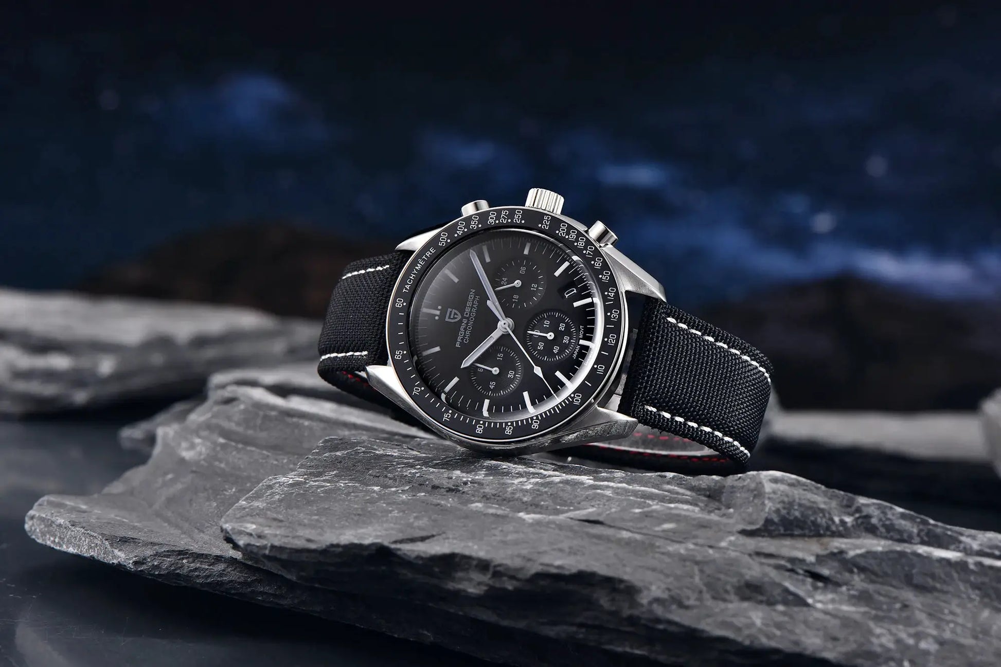 PAGANI DESIGN men's chronograph wristwatch with black dial, tachymeter bezel, and fabric strap