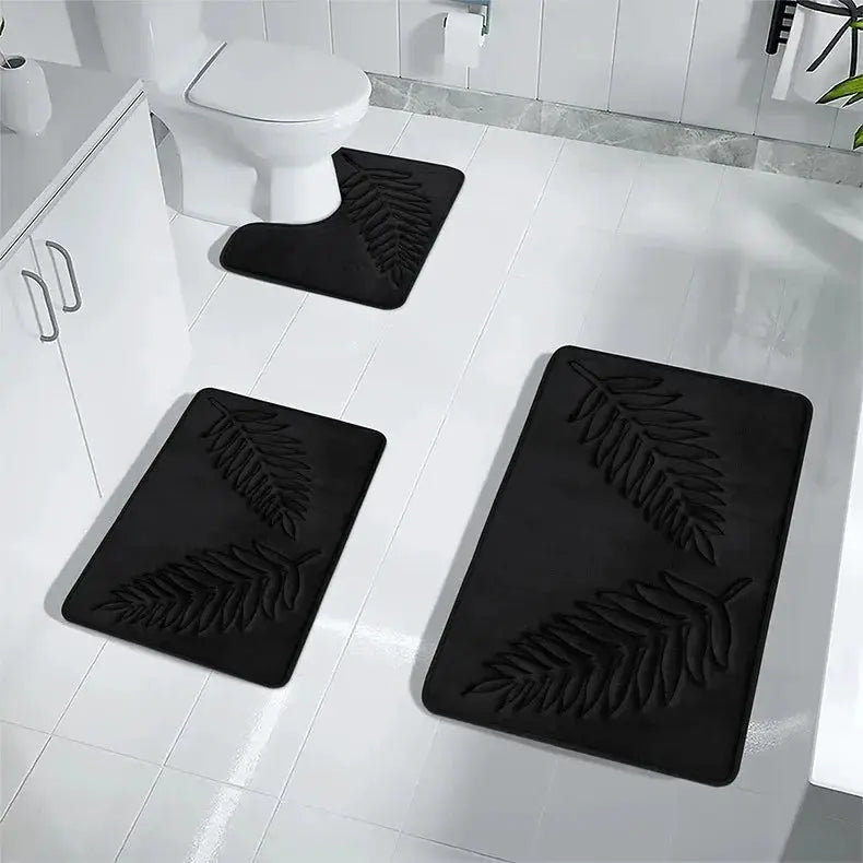 Simples Market 3-piece black memory-foam bath mat set with embossed leaf pattern for bathroom.