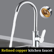 Kitchen faucet with curved chrome spout and single lever handle over a sink, water flowing from the spout