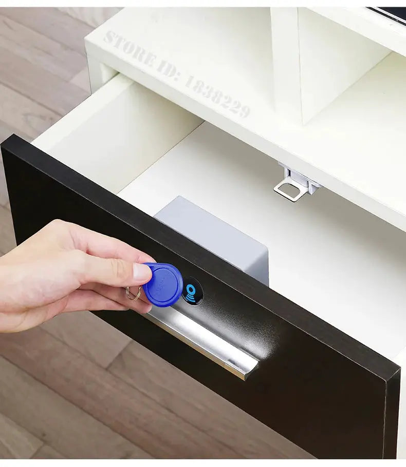 KAK RFID cabinet lock with invisible sensor; keyless drawer lock shown with blue RFID fob