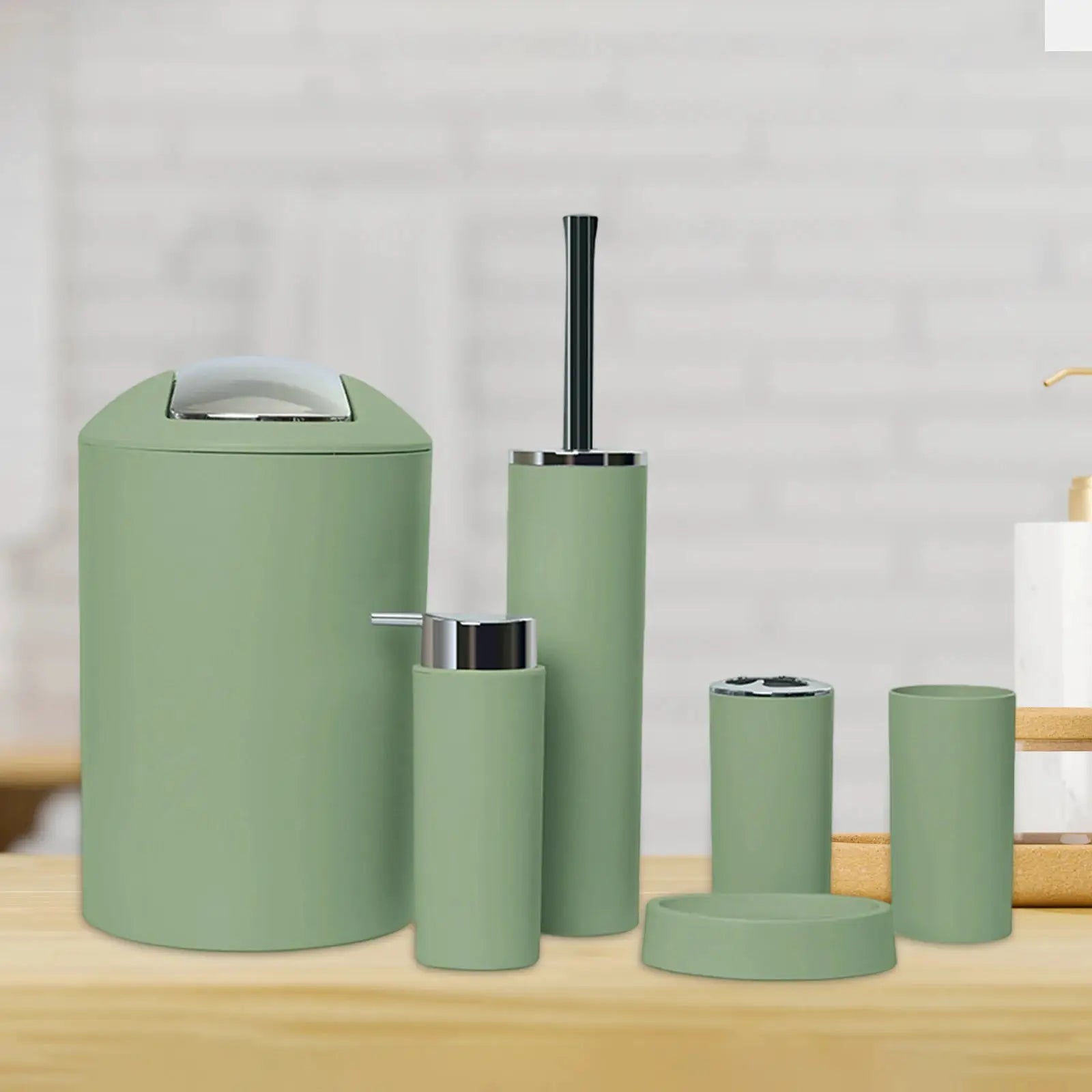 6-piece matte green bathroom set with chrome accents; includes trash can, lotion dispenser, toothbrush holder.