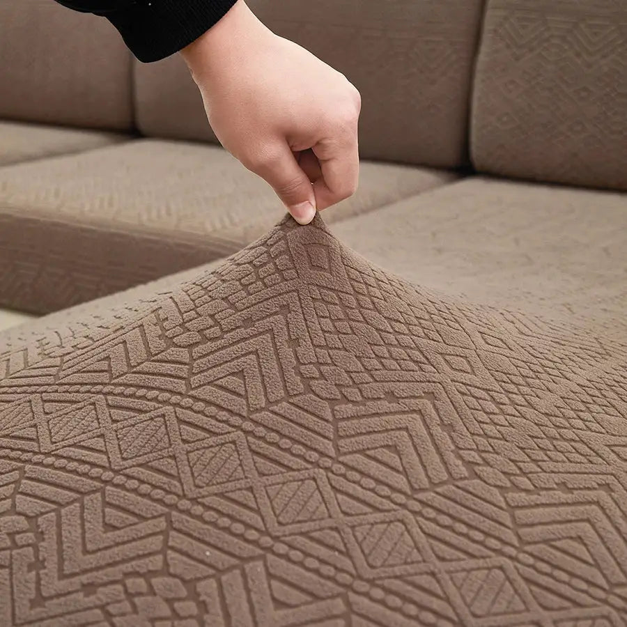 Stretch jacquard sofa bed cover in beige with geometric pattern, splash protector for living room and bedroom