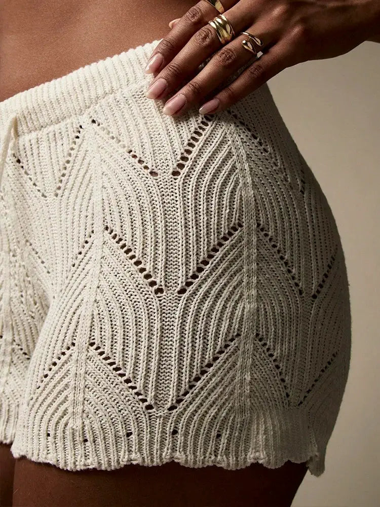 Handmade crochet knit shorts in cream, beach coverup style.