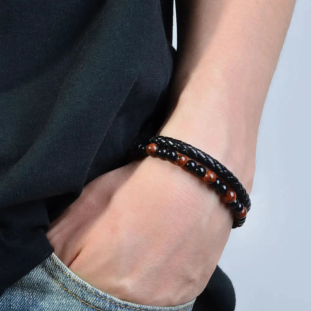 Stainless steel bracelet with tiger eye and lava stone beads on a black braided cord