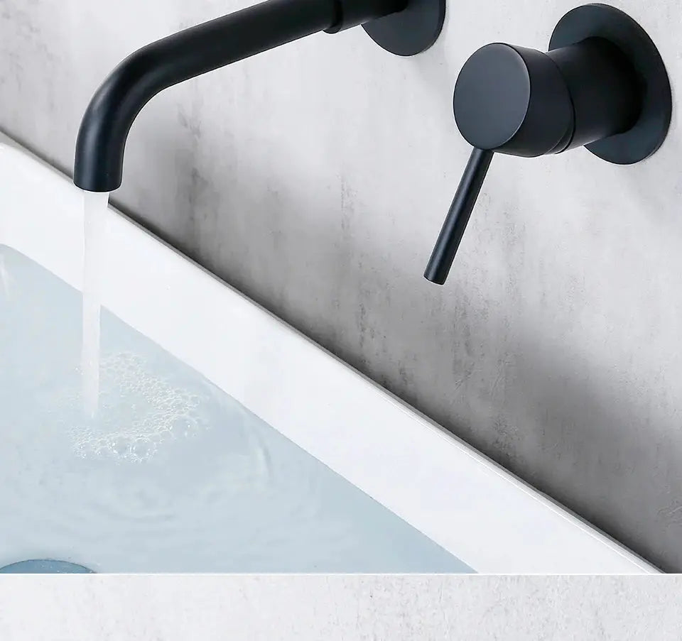 Basin faucet wall-mounted in matte black with curved spout and single lever handle for hot and cold water