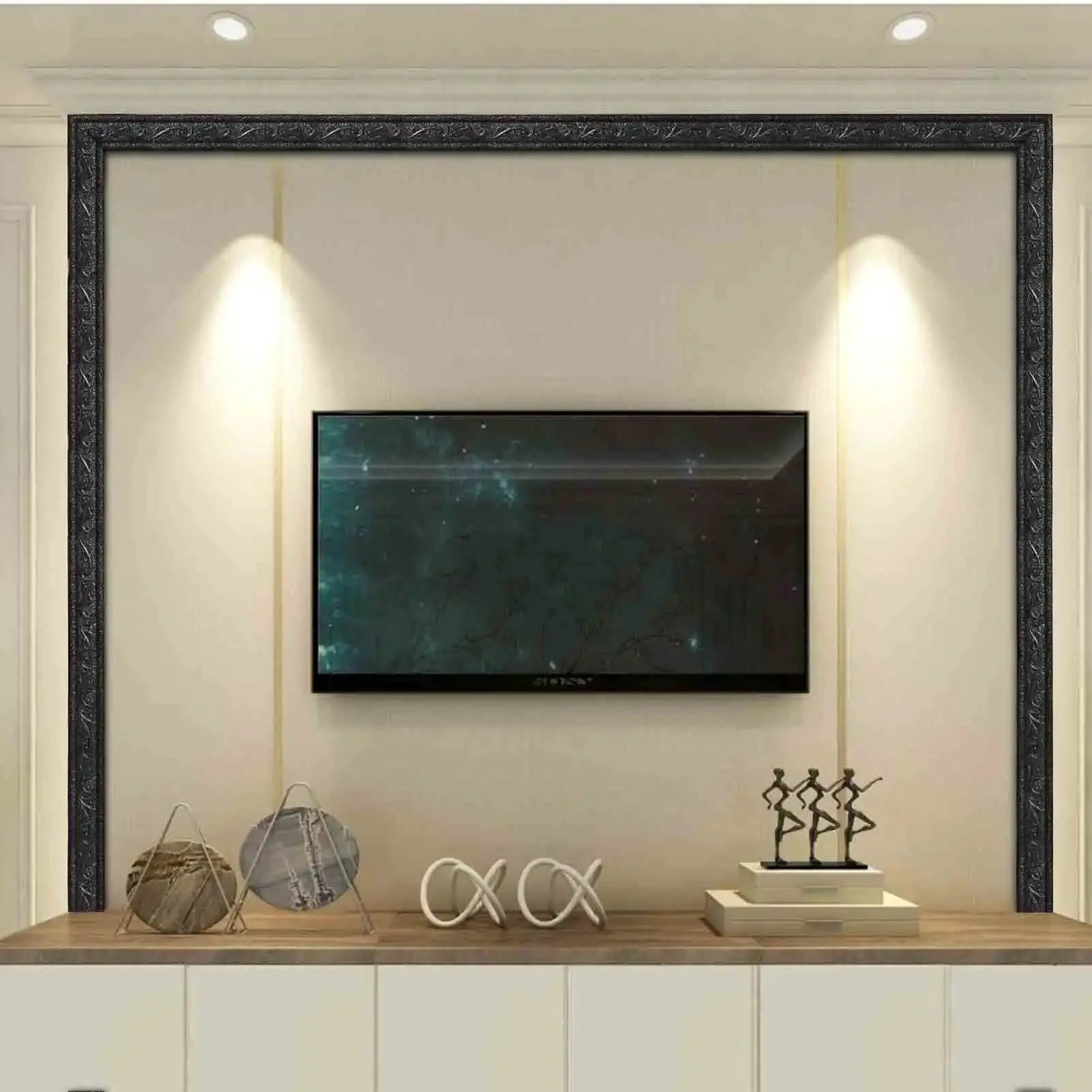 Self-adhesive wall border strip, 230×4 cm, ornate black frame wall trim around a TV on beige wall; Simples Market