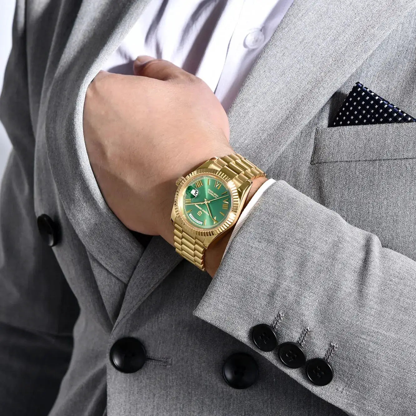 Pagani Design DD36 gold-tone stainless steel men's watch with green dial on a gray-suited wrist