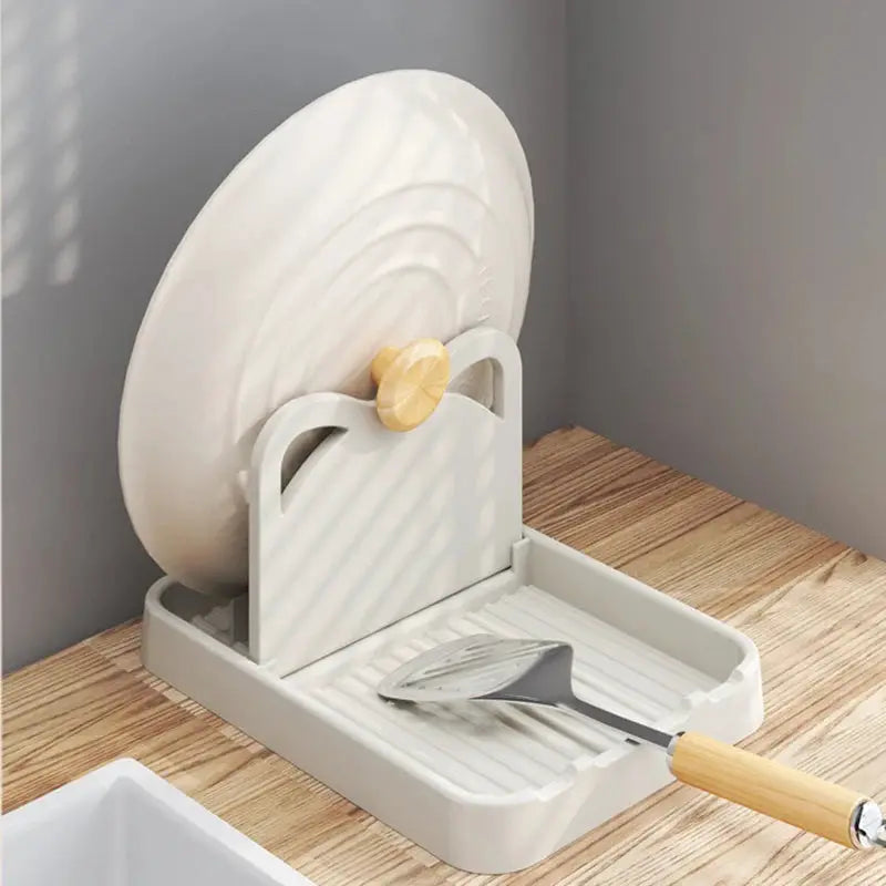 Simples Market white plastic cat-ear kitchen utensil holder for spatulas and pot lids.
