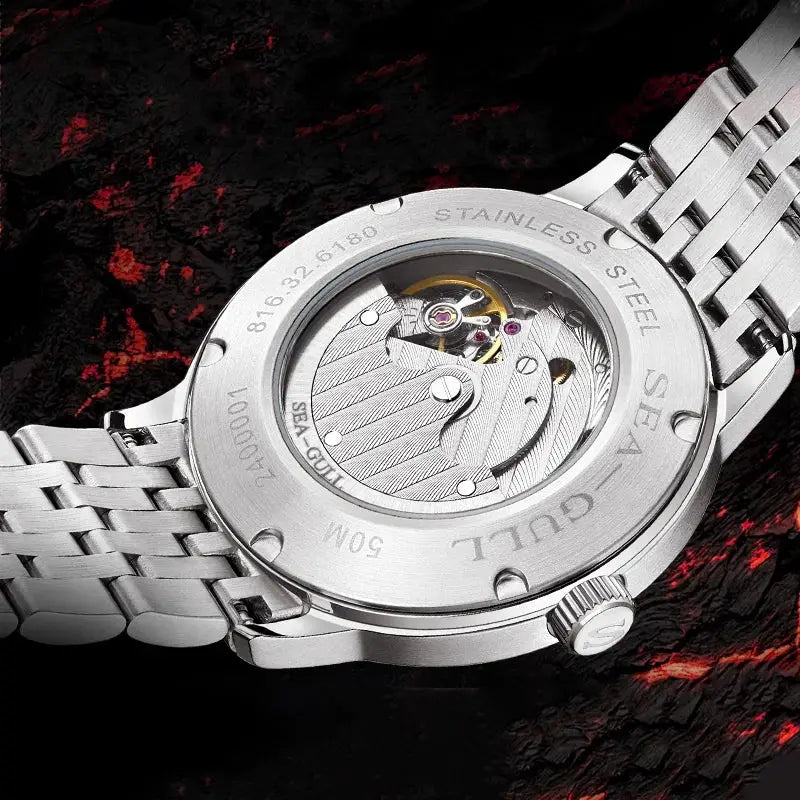 Seagull stainless steel automatic mechanical wristwatch with transparent case back revealing movement and metal bracelet