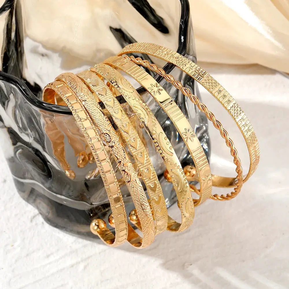 Seven Piece Punk Gold Color Bracelet Set For Women Streetwear Goth Open Bangle Heart Prints Metal Design Jewelry