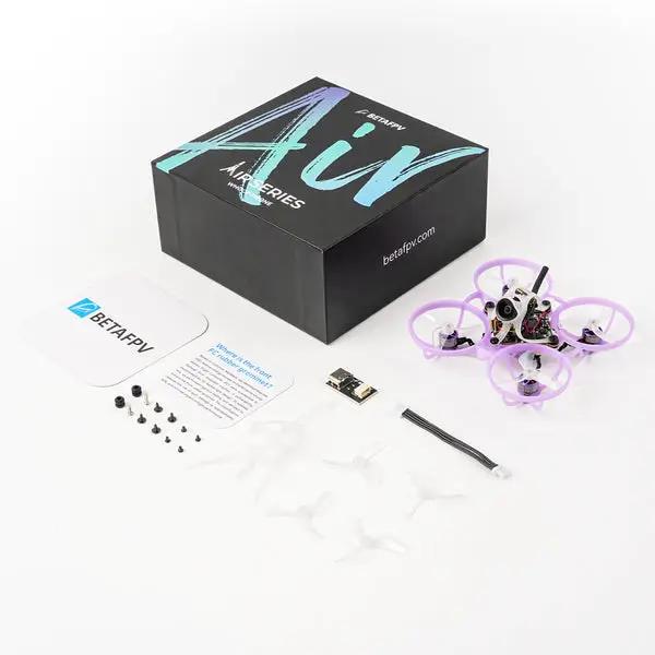 BETAFPV Air65 ll brushless whoop quadcopter with purple props, black box, USB dongle, and spare propellers
