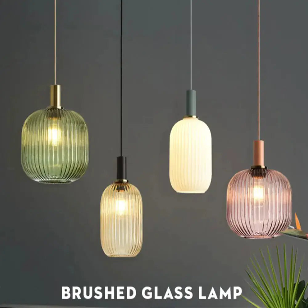 Brushed glass pendant lights set of four in green, amber, white, and pink by Simples Market.