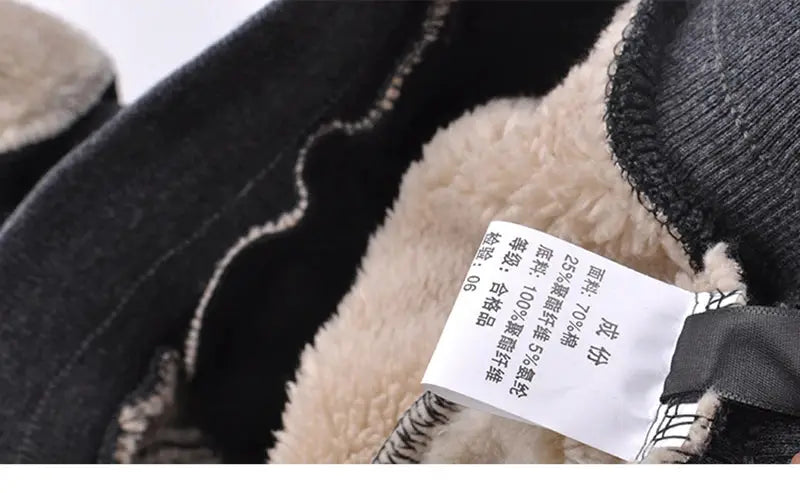 Winter thick warm fleece sweatpants for men with black exterior and beige sherpa lining