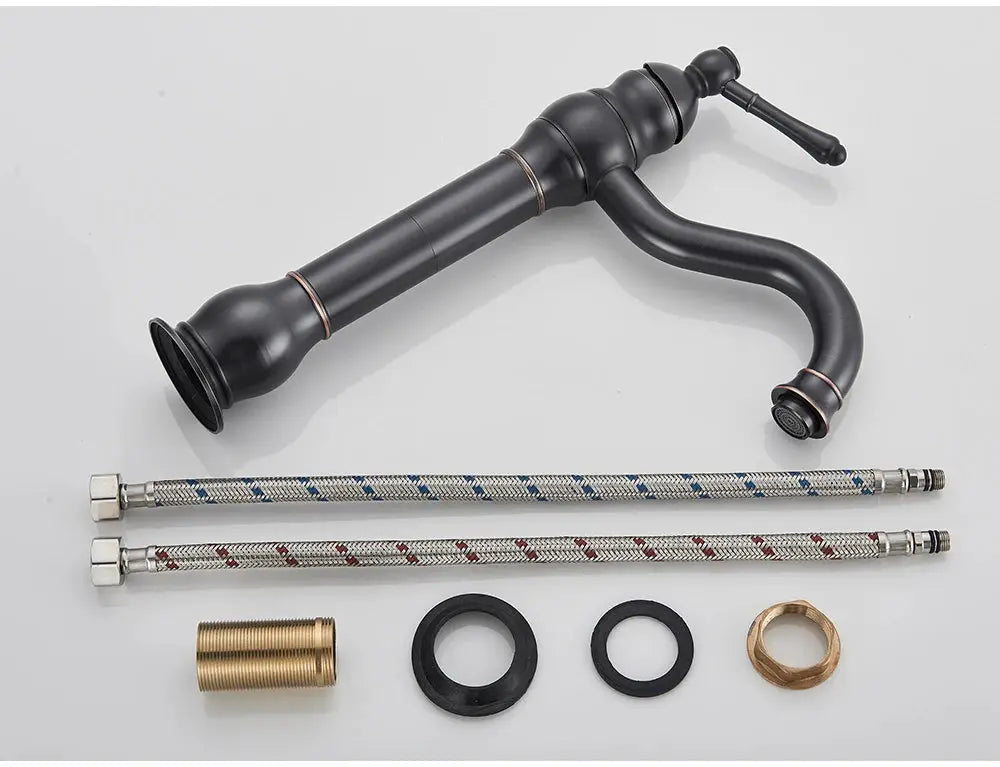 POIQIHY antique brass basin faucet with gooseneck spout; one-hole deck mount plus two braided supply lines.
