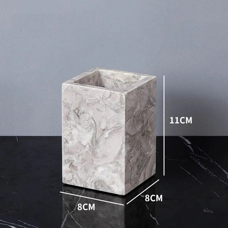 Simples Market marble bathroom accessory holder; rectangular toothbrush cup in natural marble pattern, 11 cm tall, 8 cm square base.
