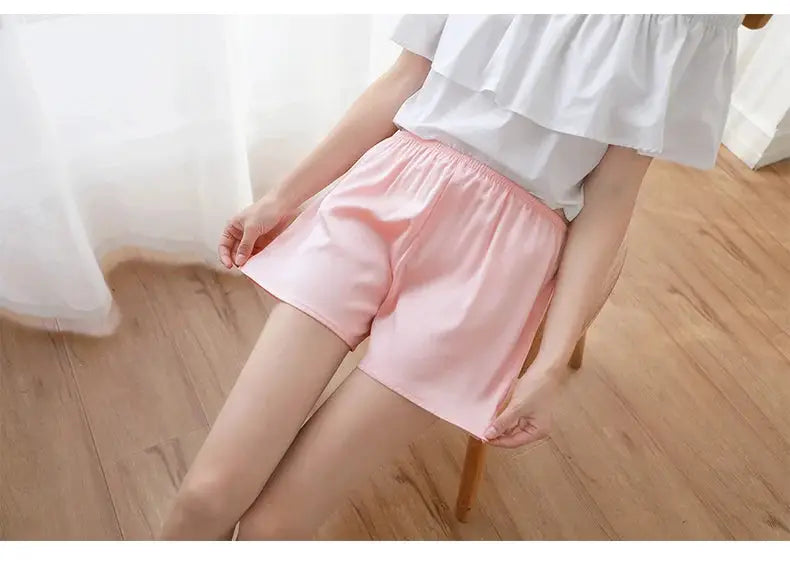 Women’s pink silk shorts with elastic waistband for comfortable home wear, Simples Market.