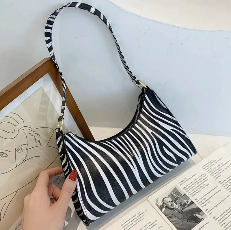 Shoulder bag Simples Market, zebra print PU leather with black-and-white striped strap