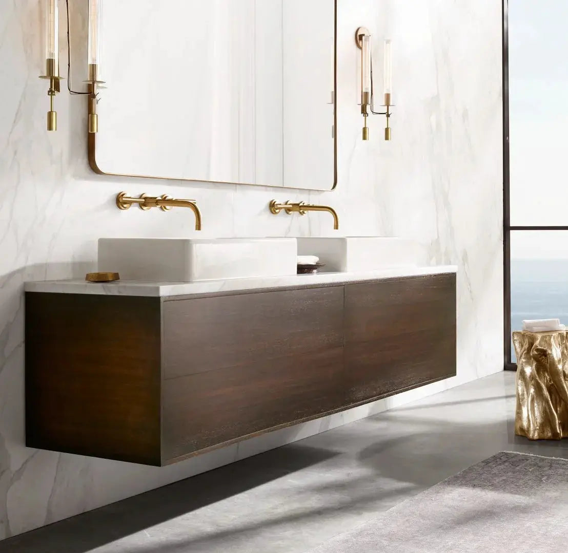 Modern copper wall sconce lamps by Simples Market flanking a large bathroom mirror above a dark wood vanity