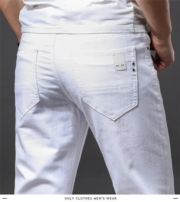Men's white jeans by Simples Market; casual slim-fit stretch trousers with back pockets