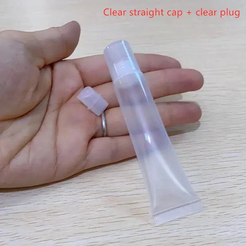 Clear lip gloss container with straight clear cap and plug