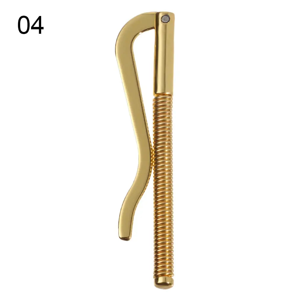 Gold metal money clip with spring clamp and curved lever, Simples Market.