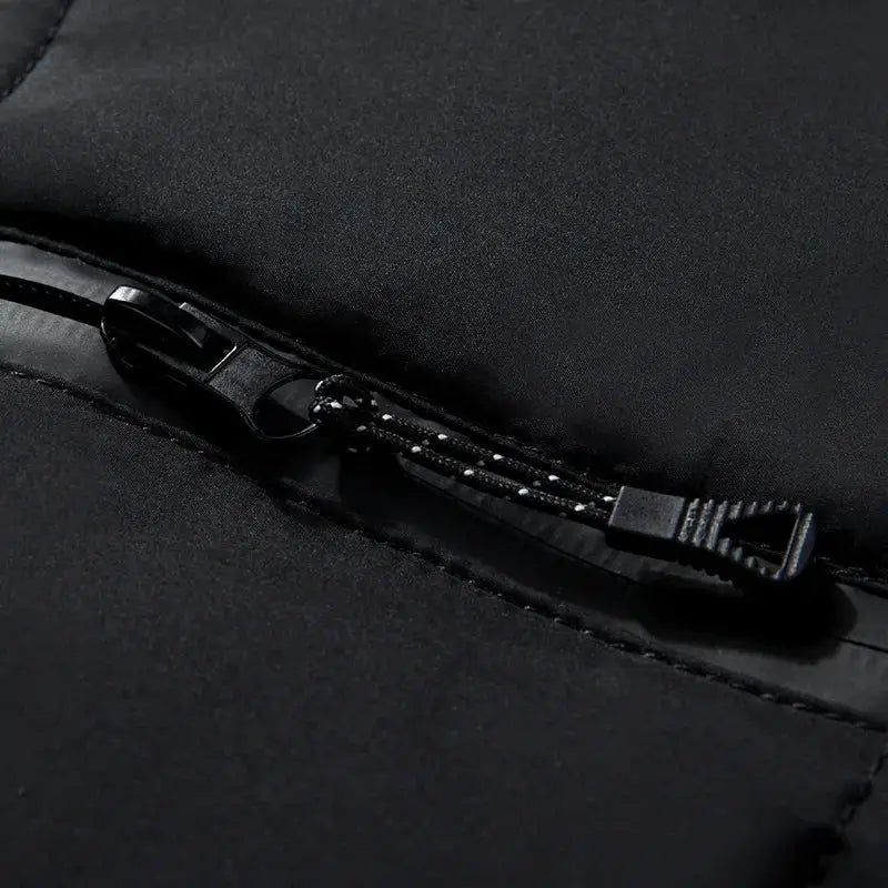 Men's down jacket zipper detail on black outer shell
