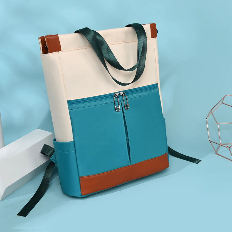 Backpack Simples Market waterproof Oxford fabric, color-block teal blue with cream top and brown base