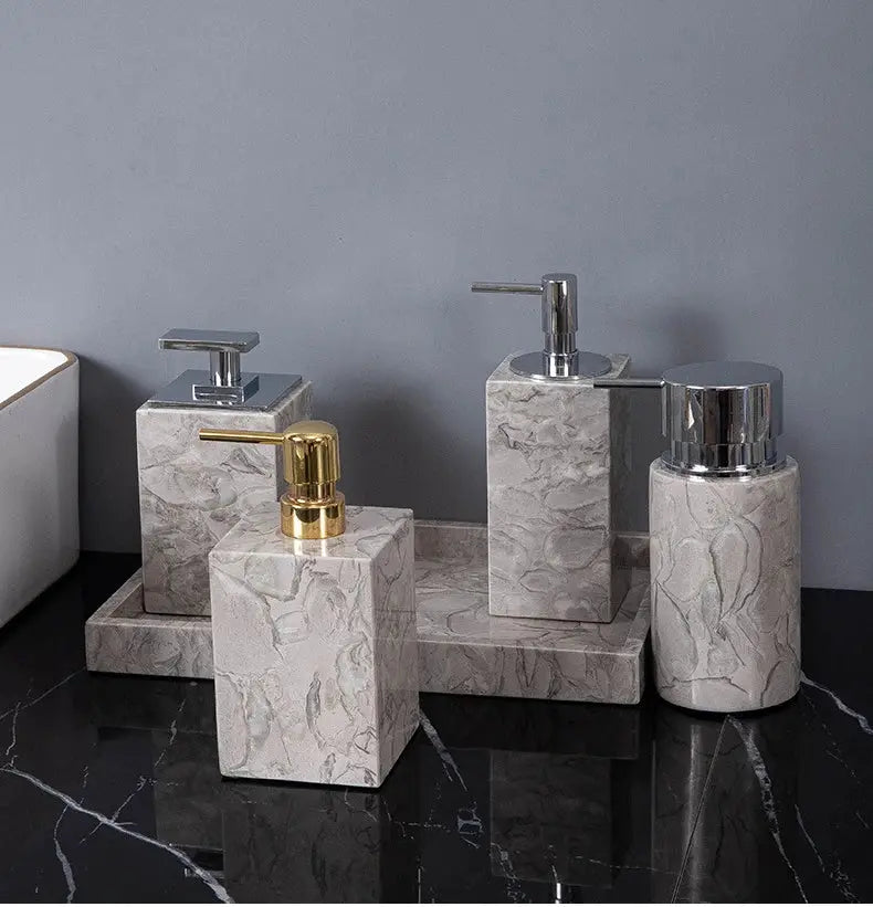 Five-piece gray marble bathroom set with soap dispenser, toothbrush holder, cup, soap dish, and cotton swab can