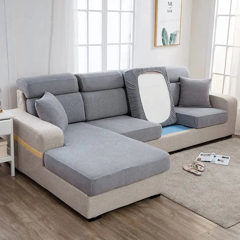Sofa seat cover for a gray sectional couch; thickened elastic protective cover on cushions in solid gray