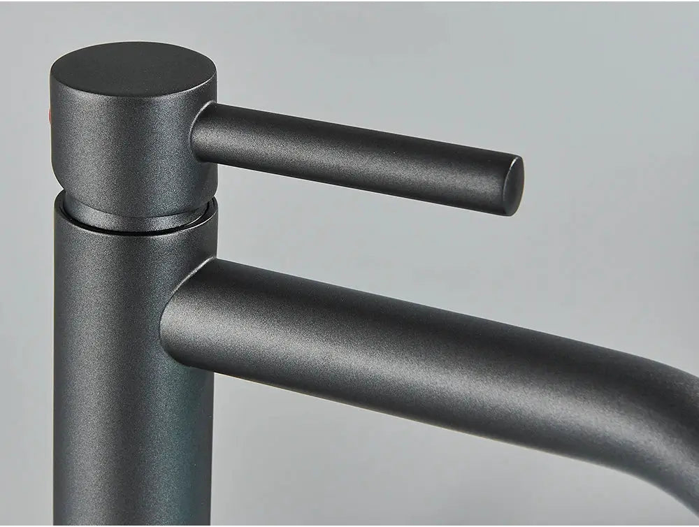 Black basin faucet with long horizontal spout and matte finish