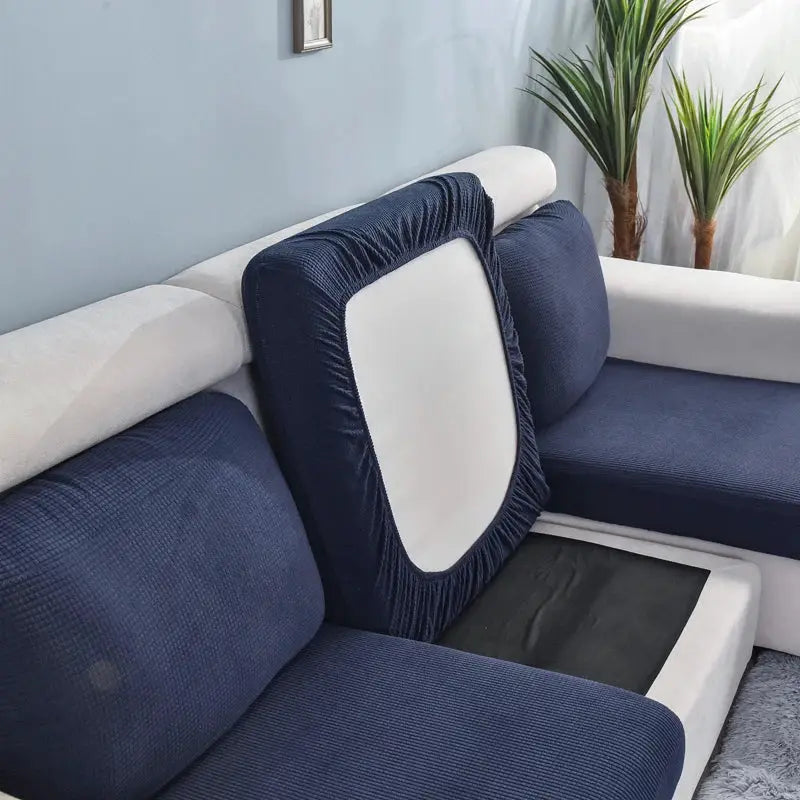 Simples Market sofa seat cushion cover in navy blue; stretch, washable slipcover protecting cushions.