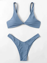 Blue solid bikini set with twist-front padded top and high-leg bottom by Simples Market