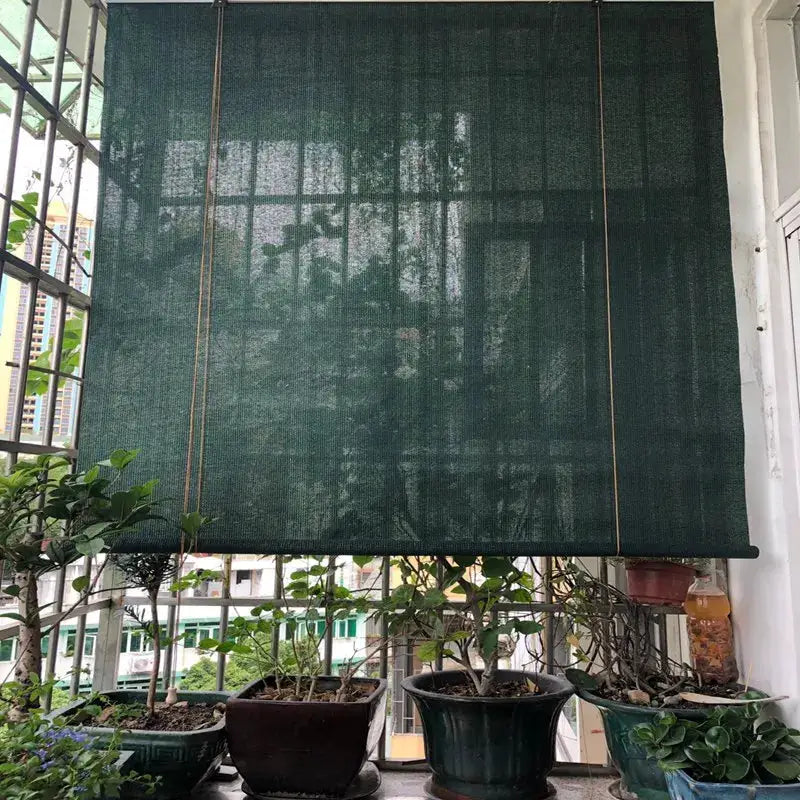 Tewango 95% UV-blocking HDPE sun shade net for balcony, dark green privacy screen by Simples Market.