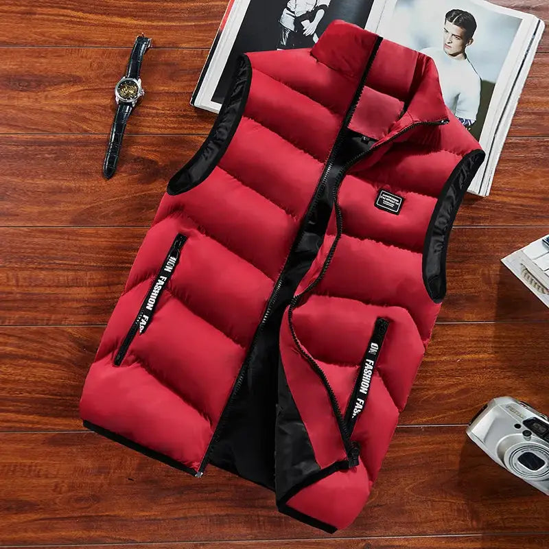 Mens sleeveless red puffer vest with black trim and zip pockets