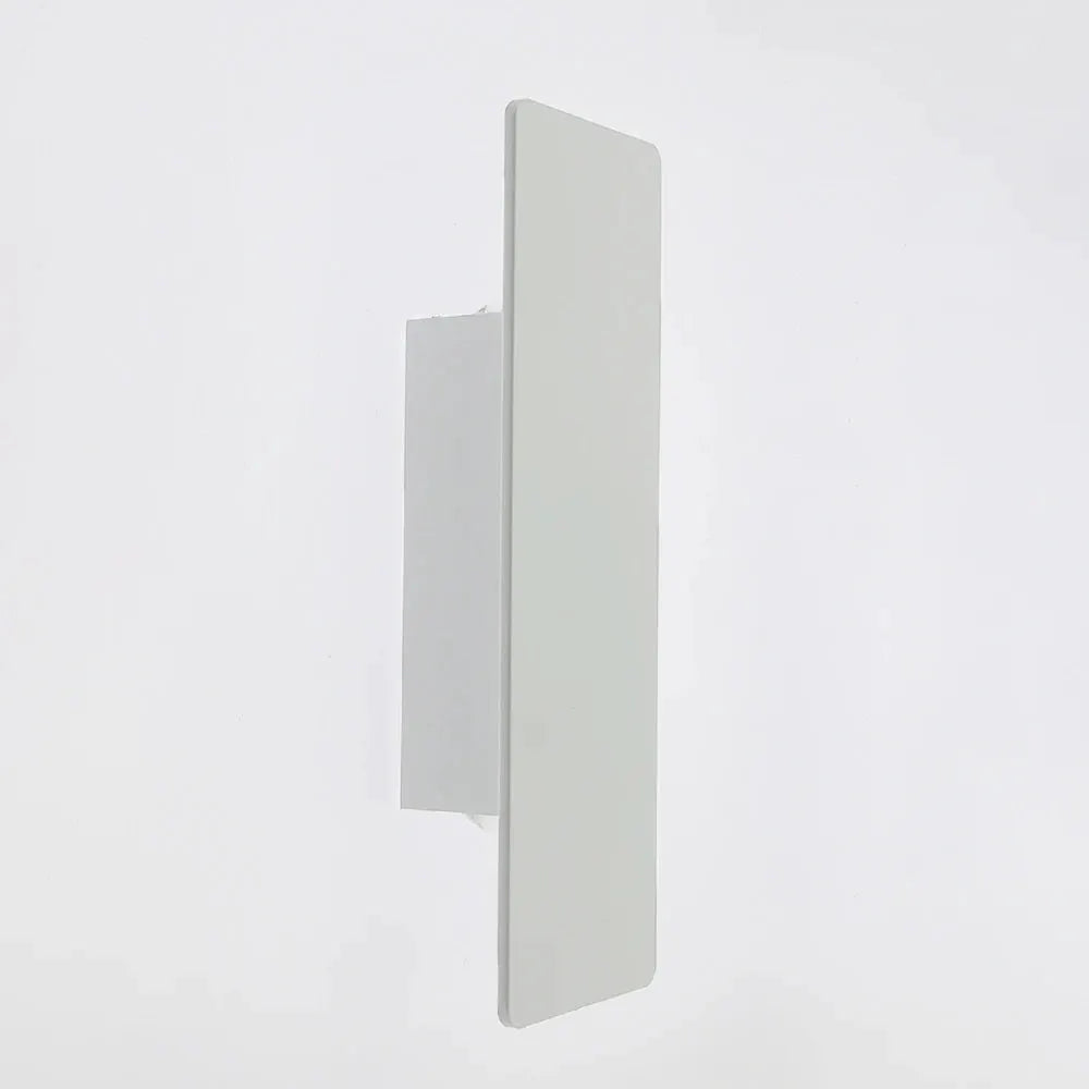 Modern LED indoor wall lamp in white aluminum with a tall vertical panel for bedroom lighting