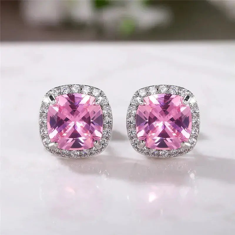 Huitan cushion-cut pink cubic zirconia stud earrings with a halo of clear stones in a silver setting (pair)