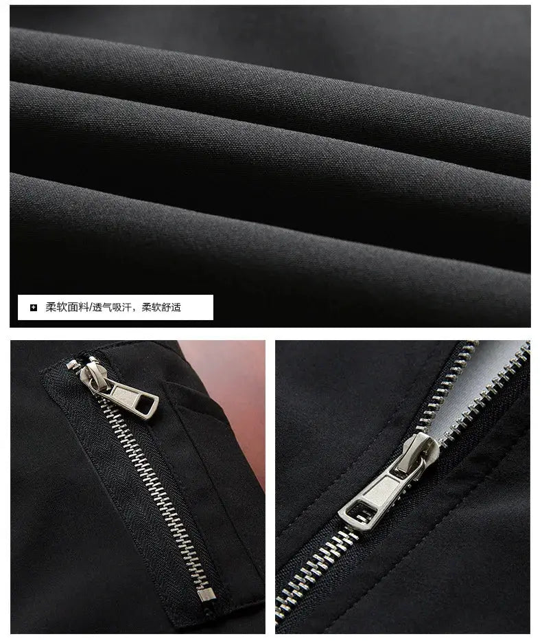 Men's black bomber jacket with metal front and sleeve zippers; lightweight windbreaker.
