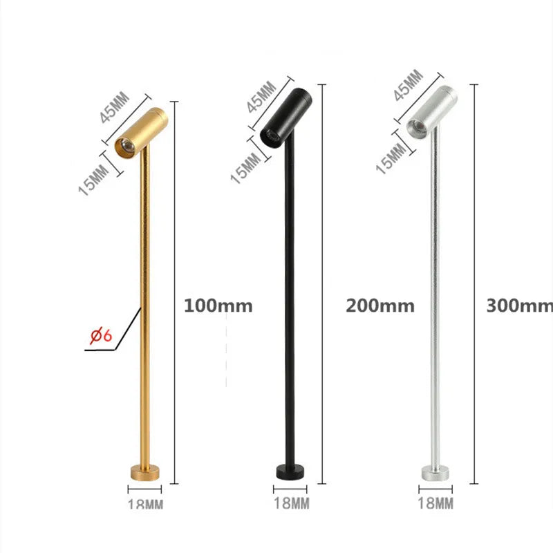 LED spotlight post lamps in gold, black and silver; three units with 100/200/300mm heights for jewelry store displays.