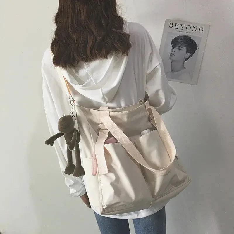 Beige waterproof Oxford large-capacity women's handbag with dual top handles and adjustable crossbody strap