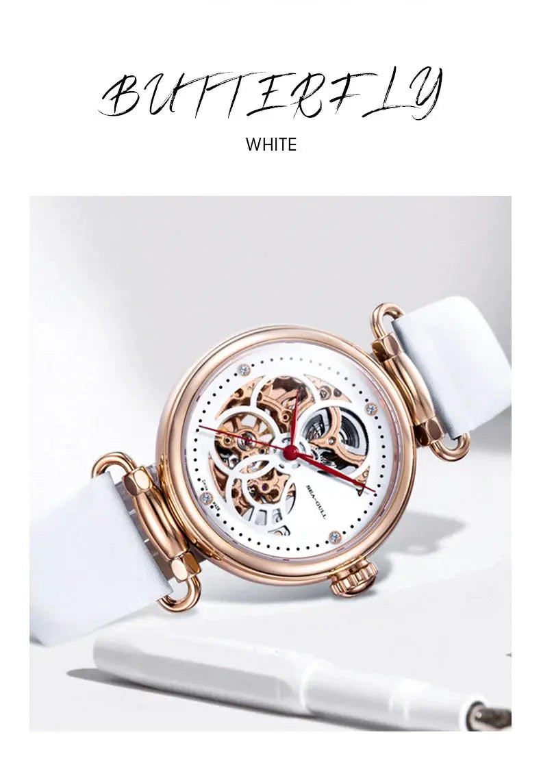 Women's skeleton dial watch with rose-gold case and white leather strap