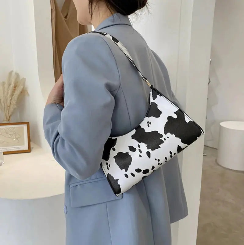 Shoulder bag with black-and-white cow print PU leather by Simples Market