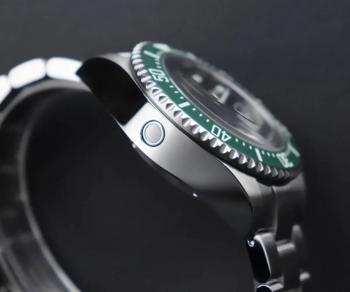 Cronos automatic diver watch with stainless steel bracelet and green bezel